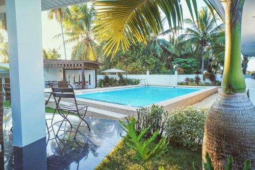 www.questvillabohol.com