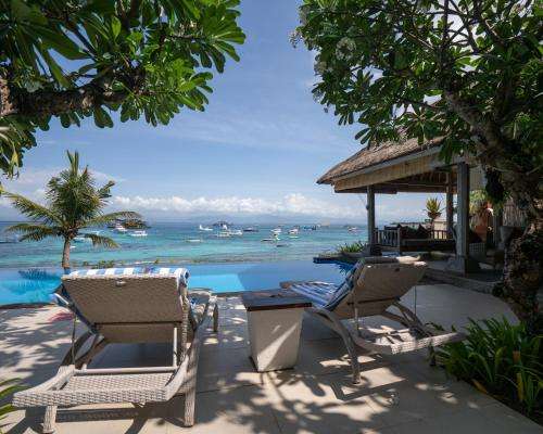 www.villacorallembongan.com