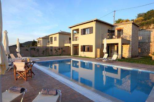 www.villasontheclouds.gr
