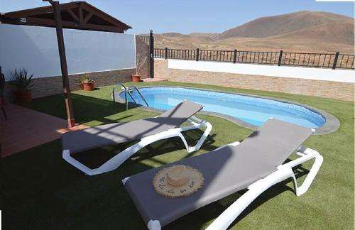 www.holidayshomefuerteventura.com